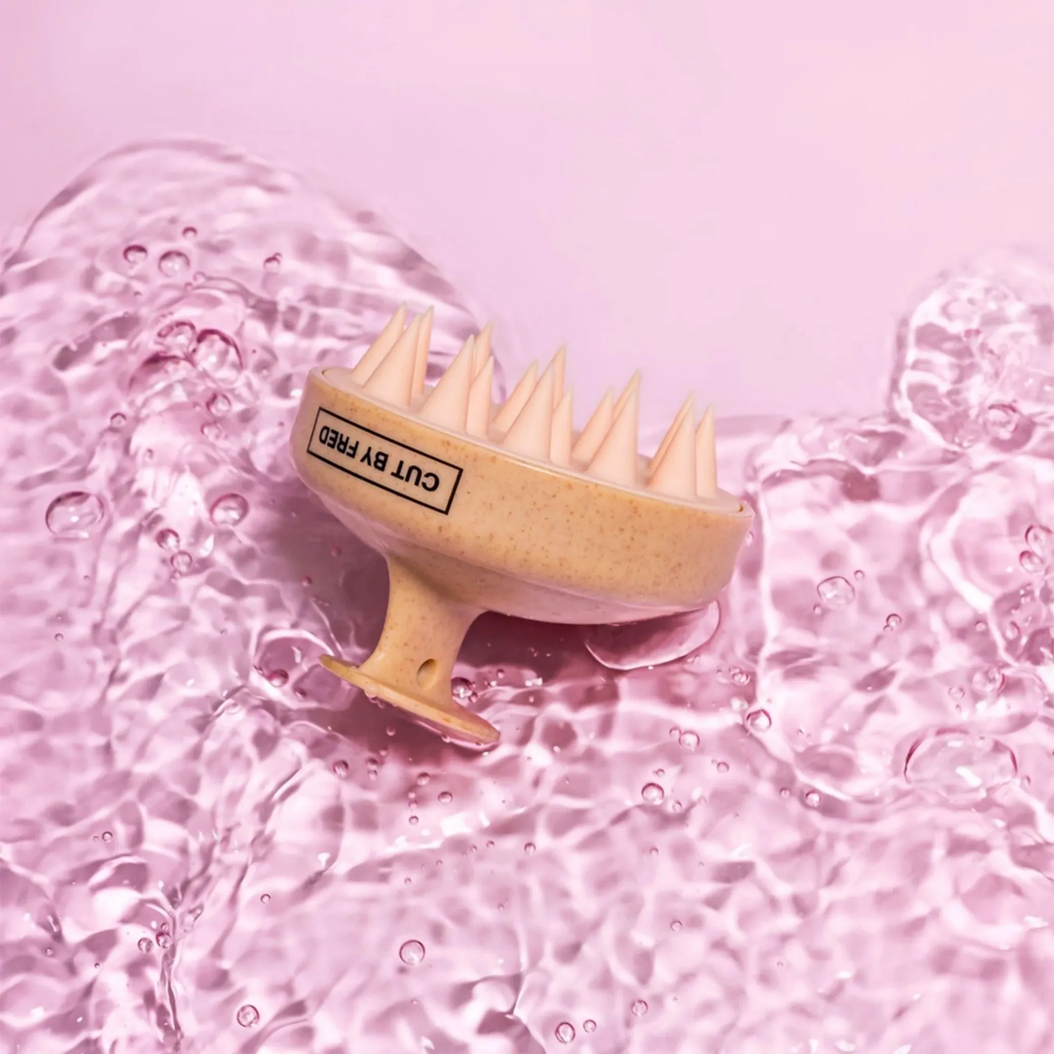 Cepillo estimulador capilar